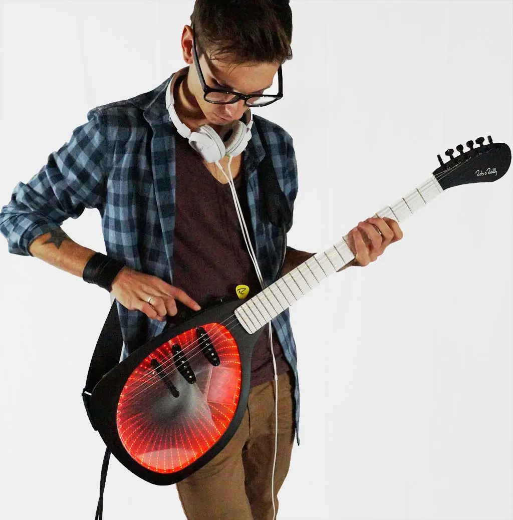 Pressing a string against a fret creates a switch, much the same as a key in a keyboard, the smart fret scanner then decodes which strings are being pressed accurately