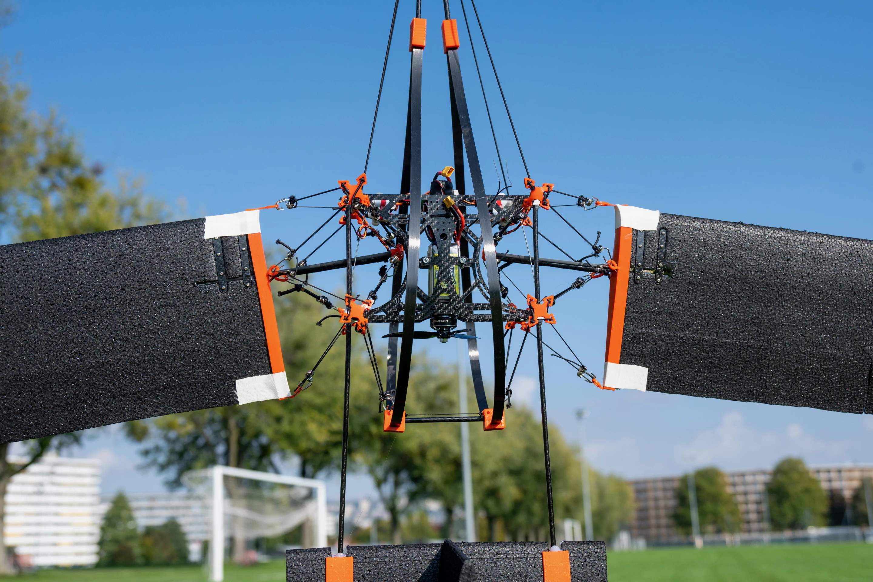 A nose-up view of the SWIFT drone, which measures 980 mm (38.58 in) in length, has a