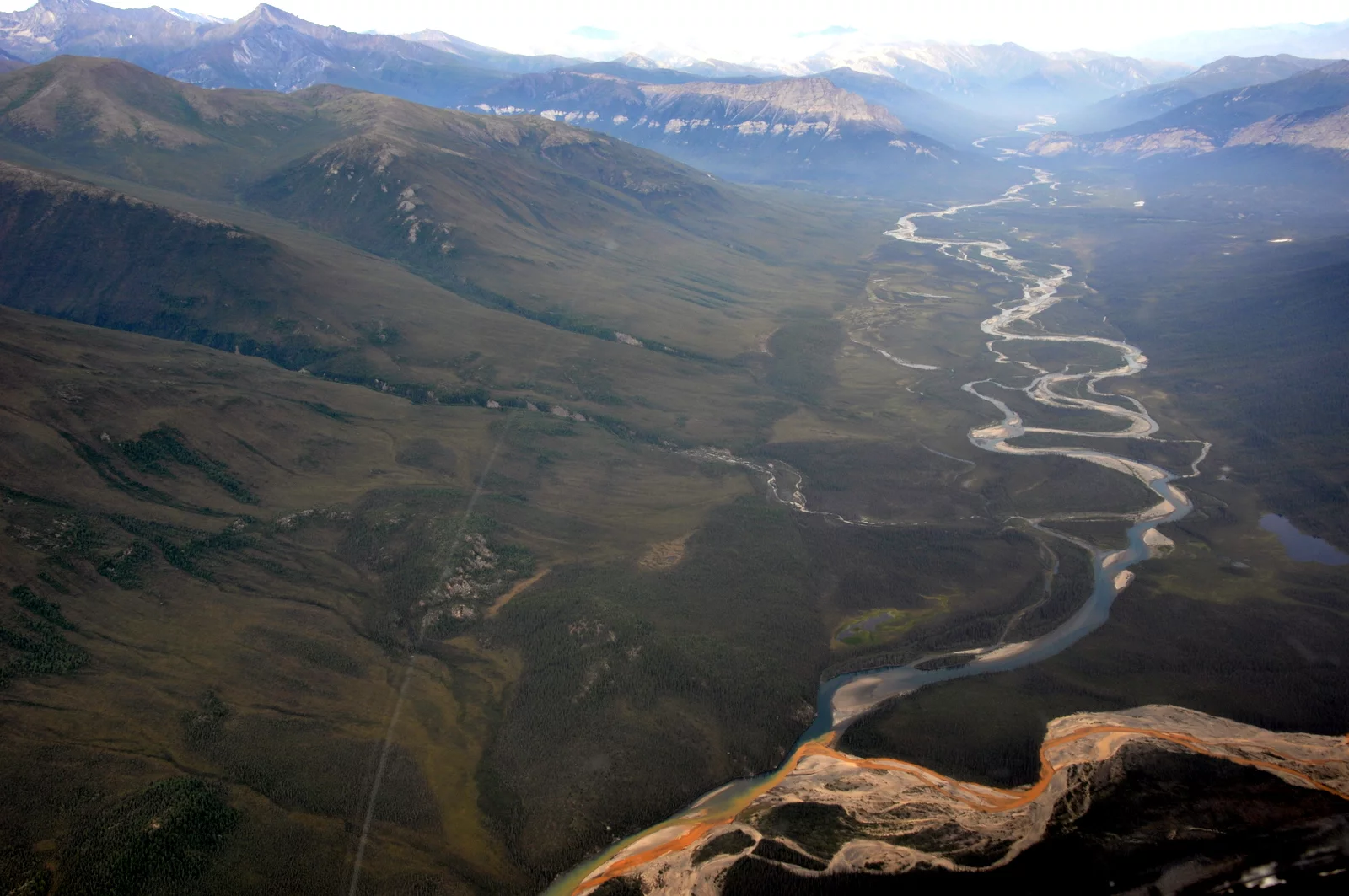 An aerial view of the Kutuk River in Alaska’s Gates of the Arctic National Park, where a portion of the water is rust-stained