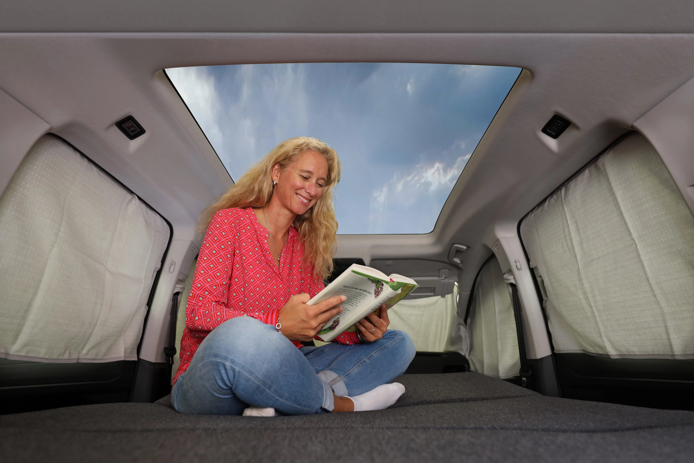 The available panoramic roof is like a large skylight with views of the stars or blue sky