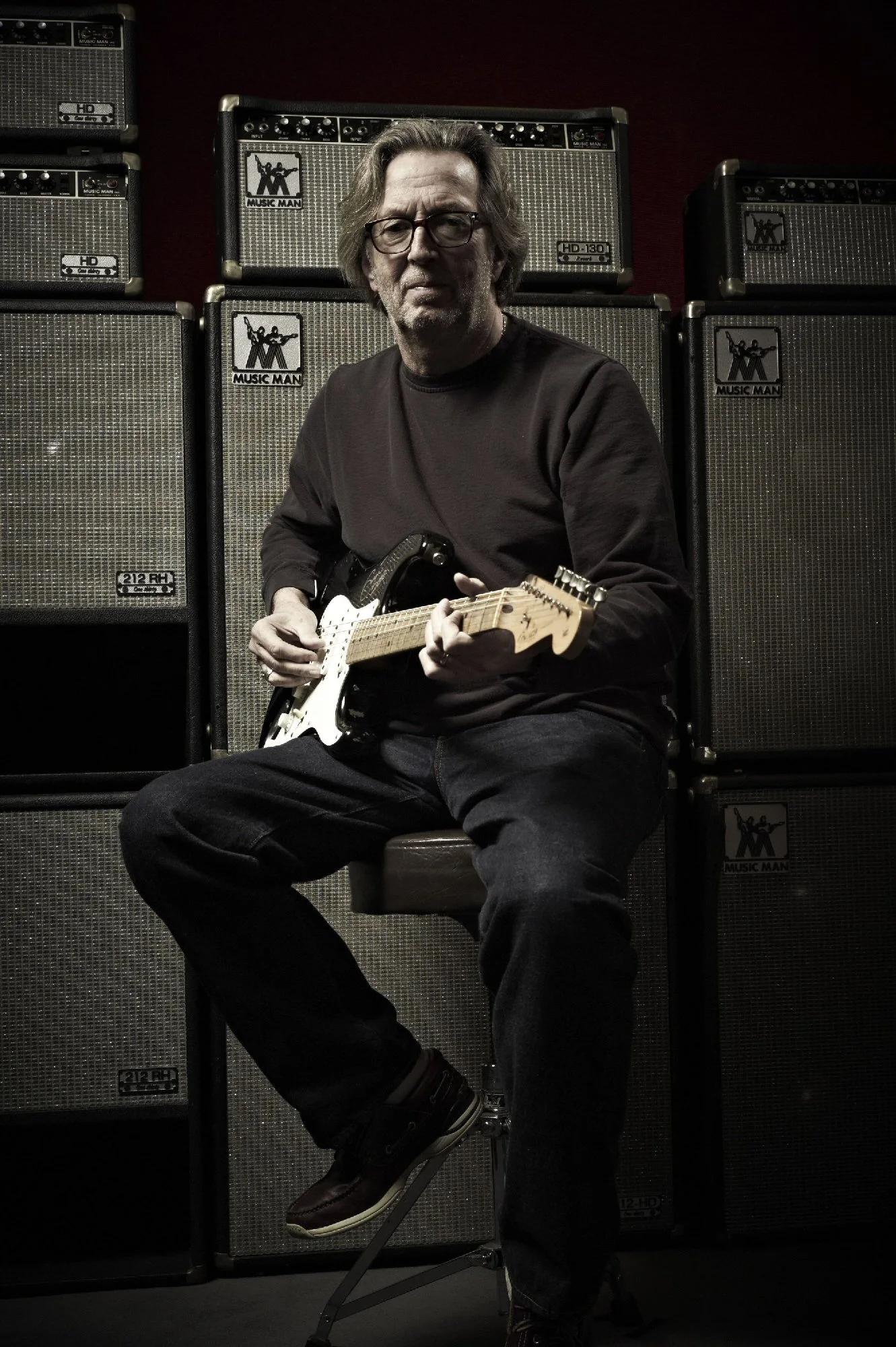 Eric Clapton with a signed 2006 'Blackie' recreation Stratocaster, estimated at between US$20,000 and US$30,000 (Credit: Original photo by Jack English, Marshbrook Limited 2010)