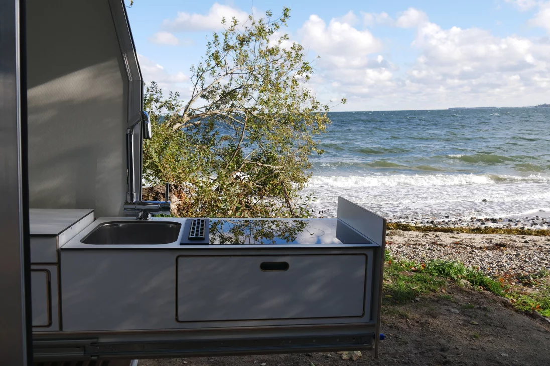 There are some perks to having the option of an outdoor kitchen