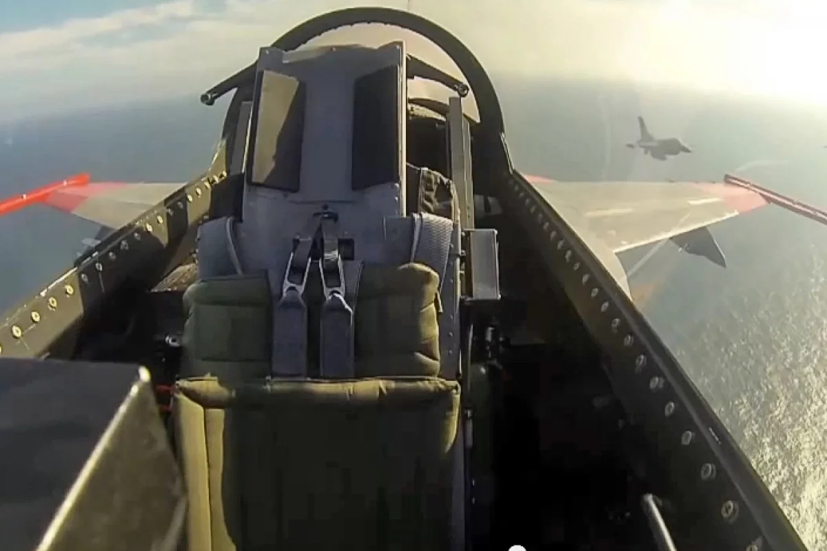 Unmanned F-16 fighter jet going through combat maneuvers in the Gulf of Mexico