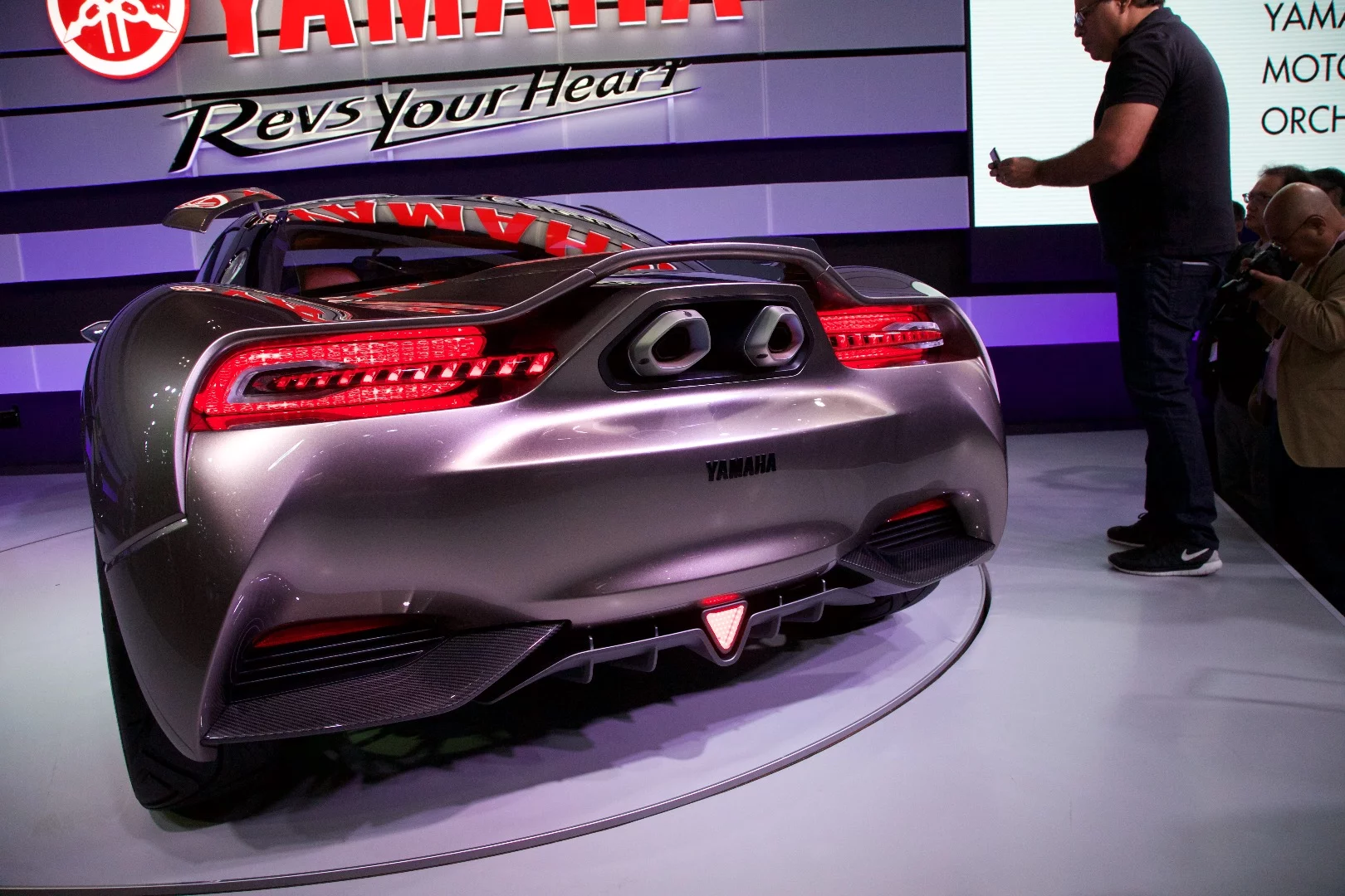 Two motorcycle-styled exhausts and a large diffuser take center stage in the Sports Ride Concept's rear