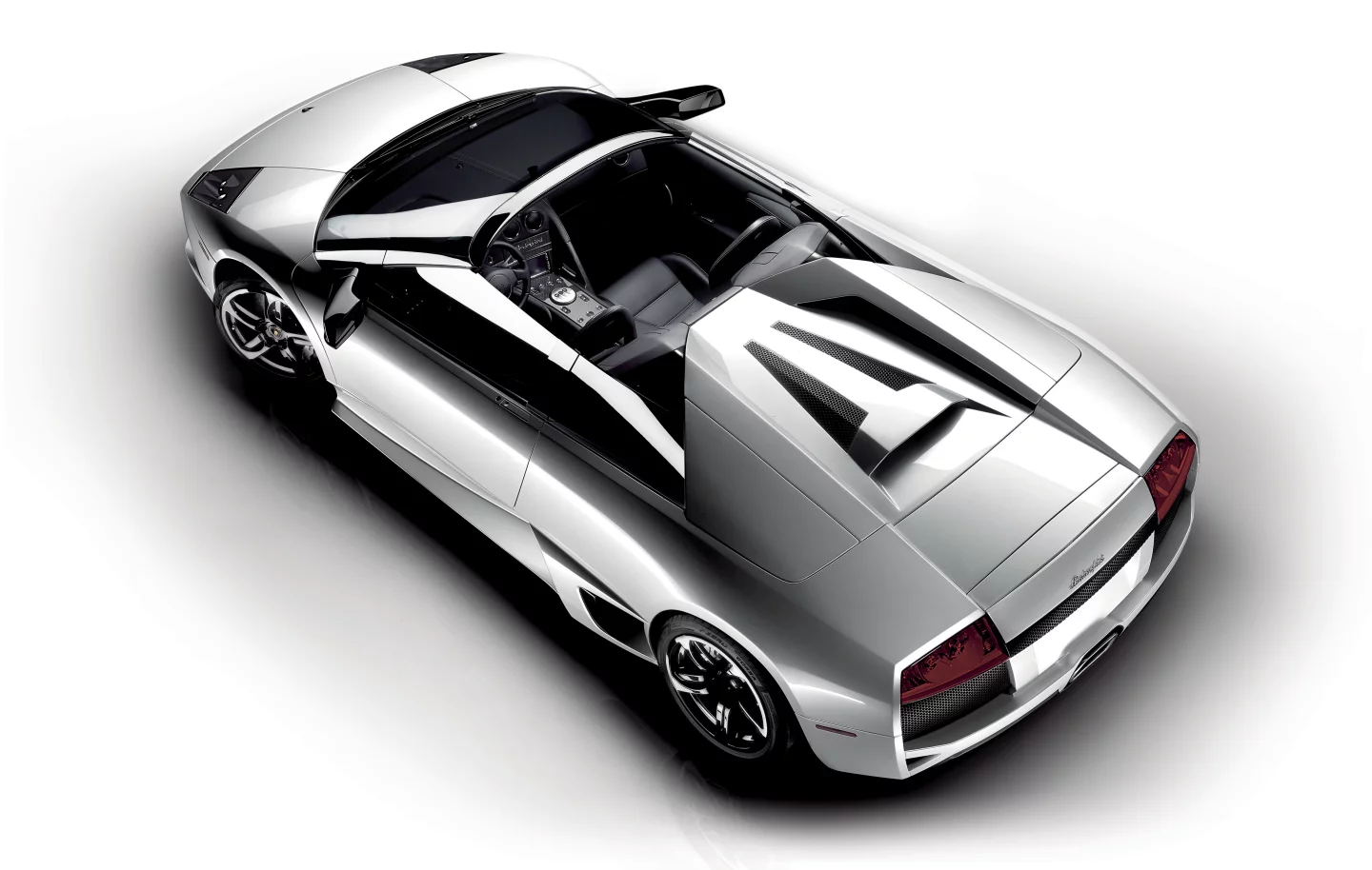 Murciélago LP640 Roadster (2007) was guaranteed to push your forehead back a few inches with its open top persona and outrageous performance