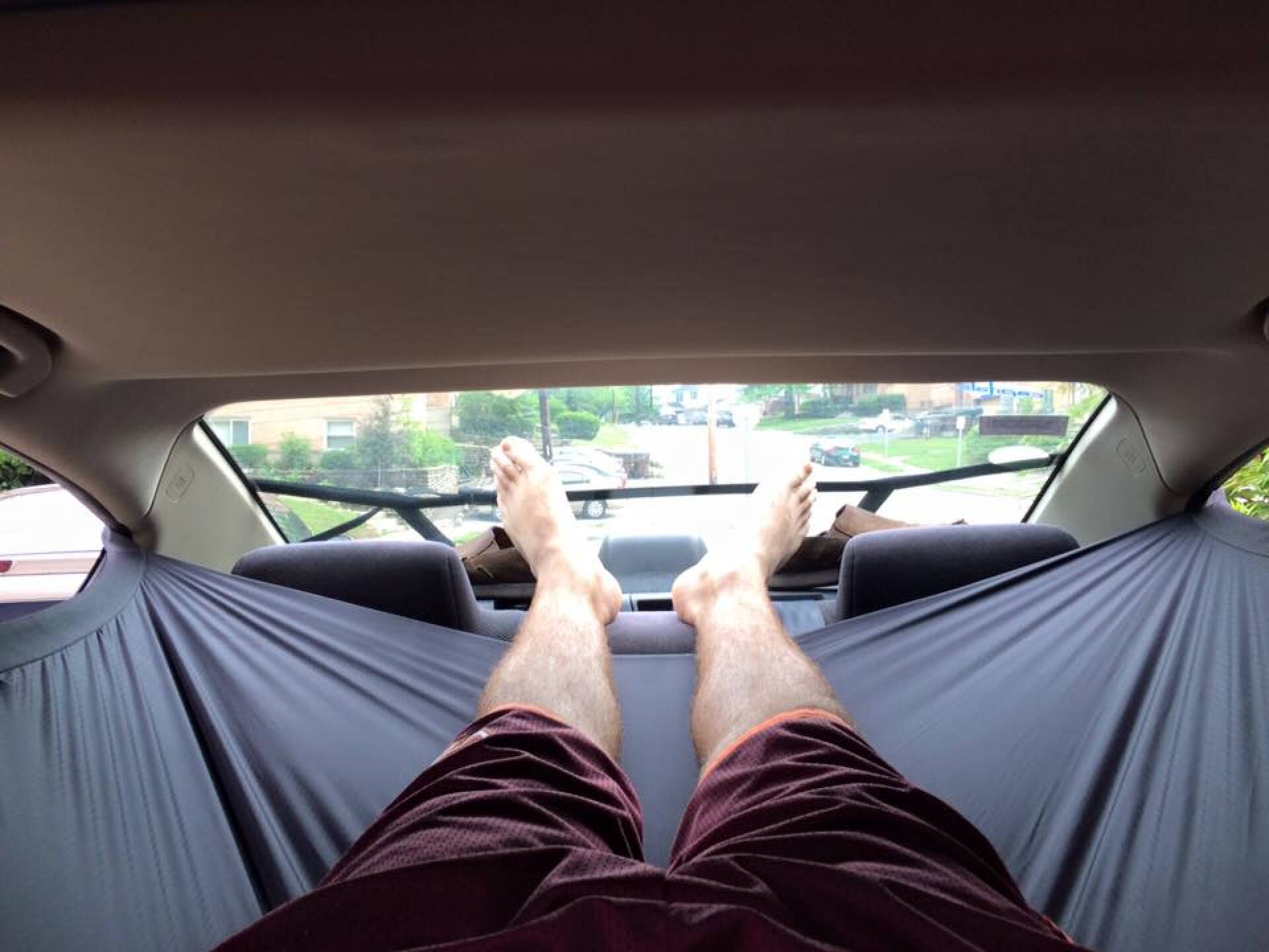 Car Hammock turns your automobile into a suspended camping lounge