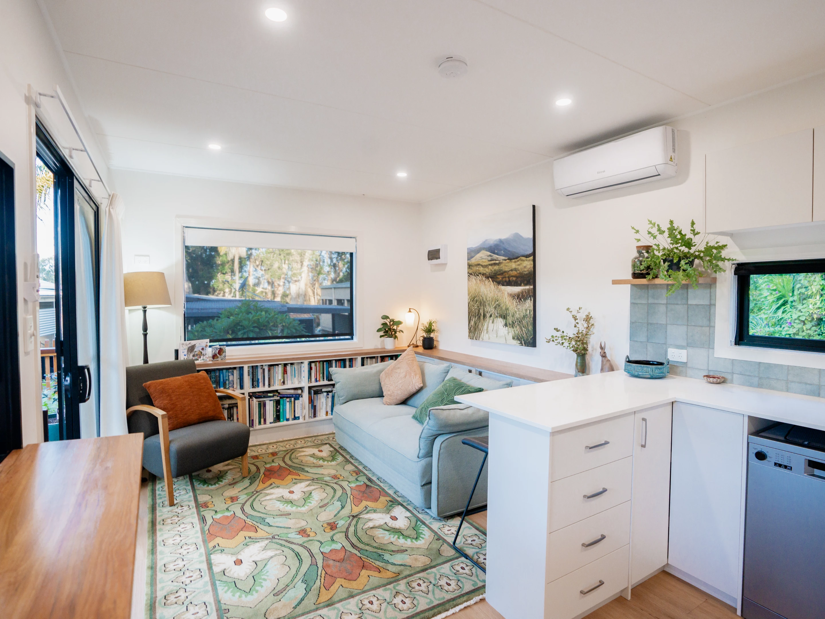 The Seaholme's living room looks light-filled thanks to the generous glazing