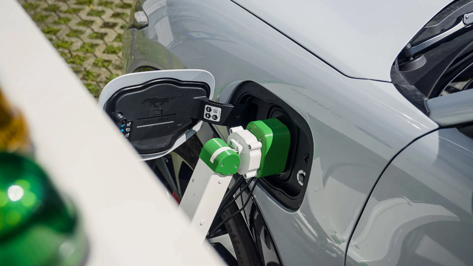 Ford's robot charging station prototype has moved from lab testing to real-world trials