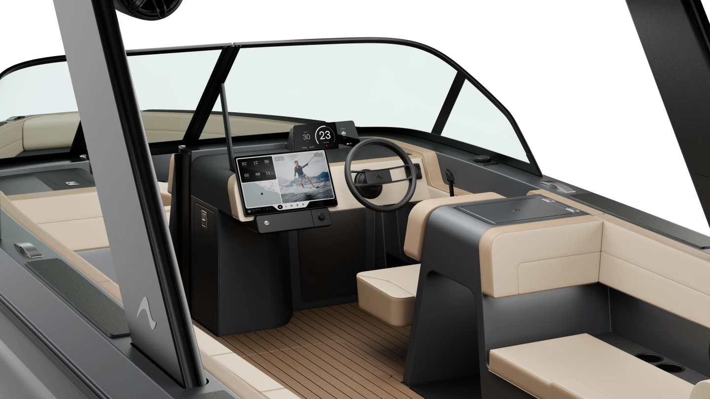 The Arc Sport's helm station features a digital dash and large infotainment screen