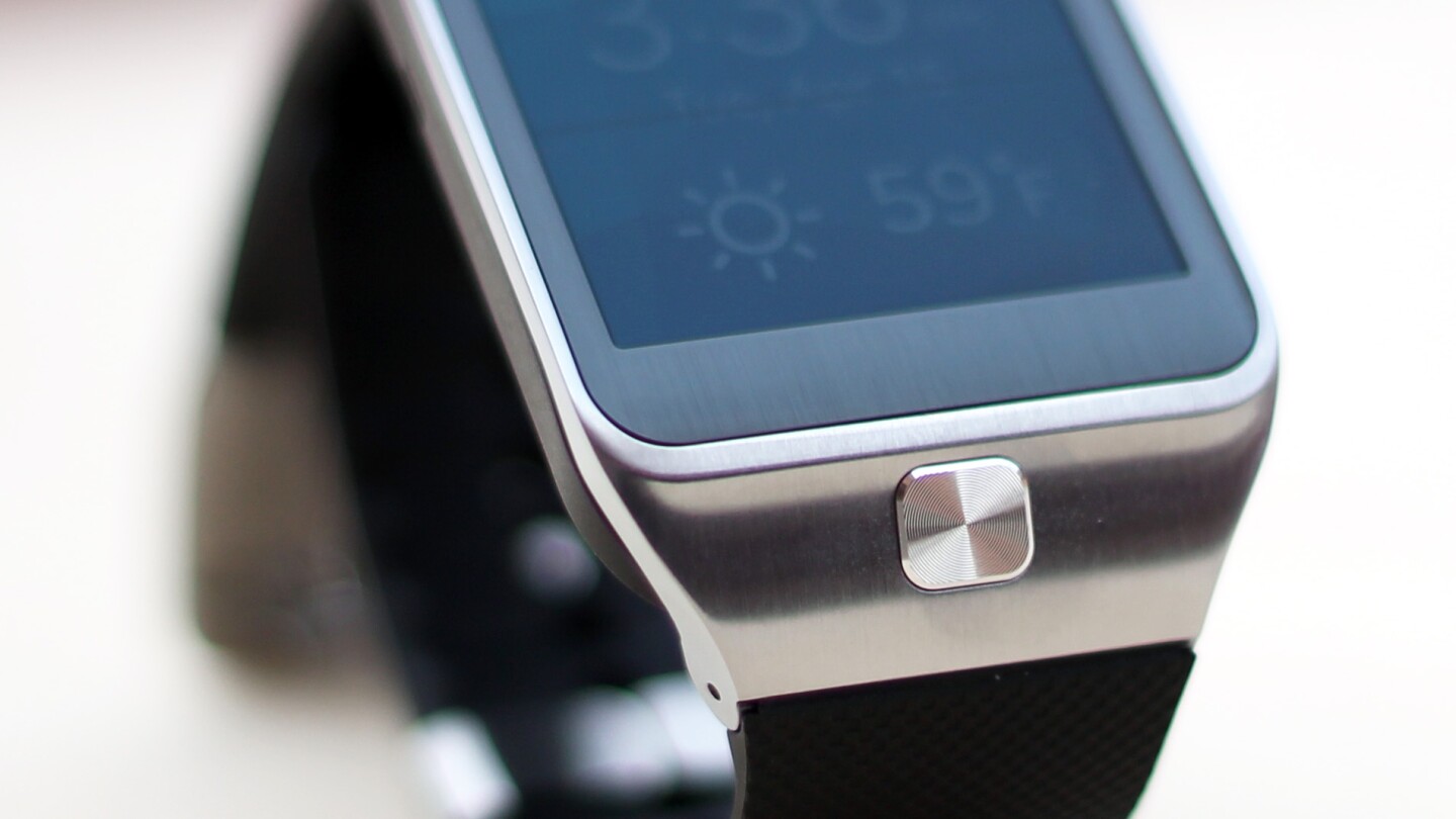 The Gear 2 has a home button (that also works as a sleep and power button) sitting below its screen
