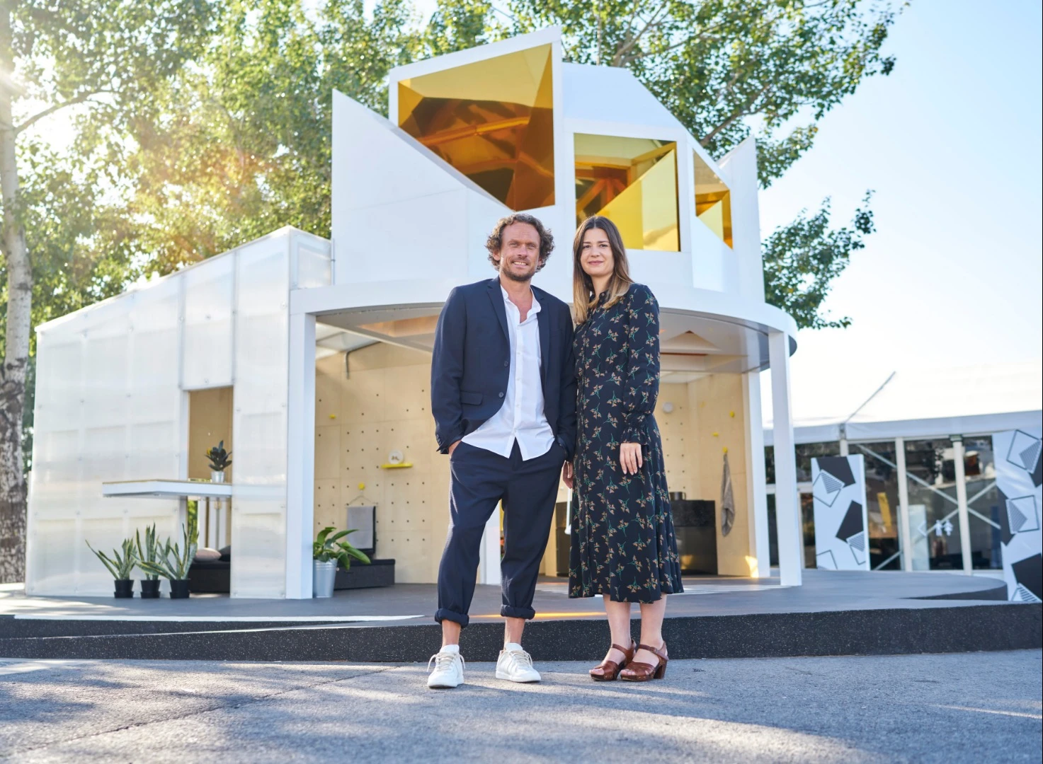 The Mini design team in front of the Mini Living Urban Cabin Beijing