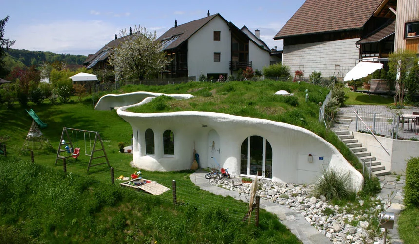 Peter Vetsch, a dominant force in earth house architecture, has built over 90 energy saving underground houses, with a strong nod to the organic forms of Gaudi