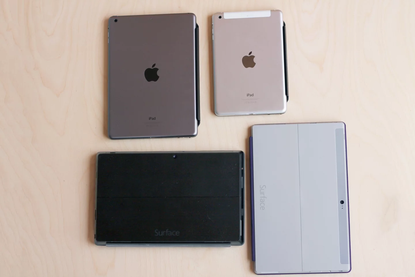 All four of our devices show their backsides