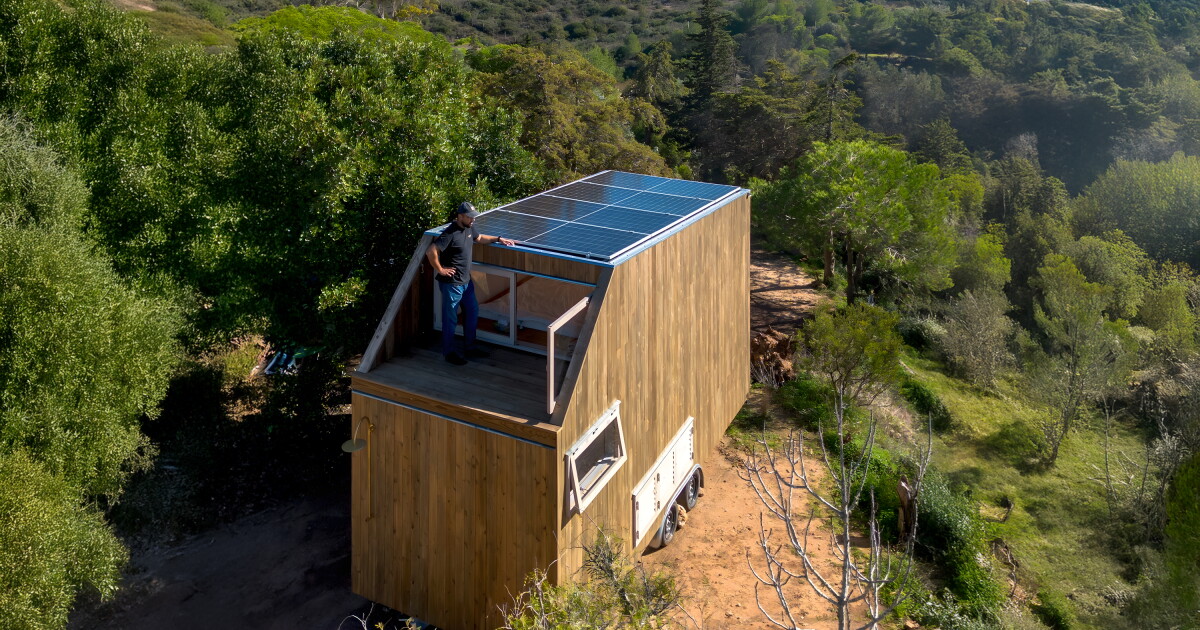 Compact timber tiny house provides off-grid escape from city life