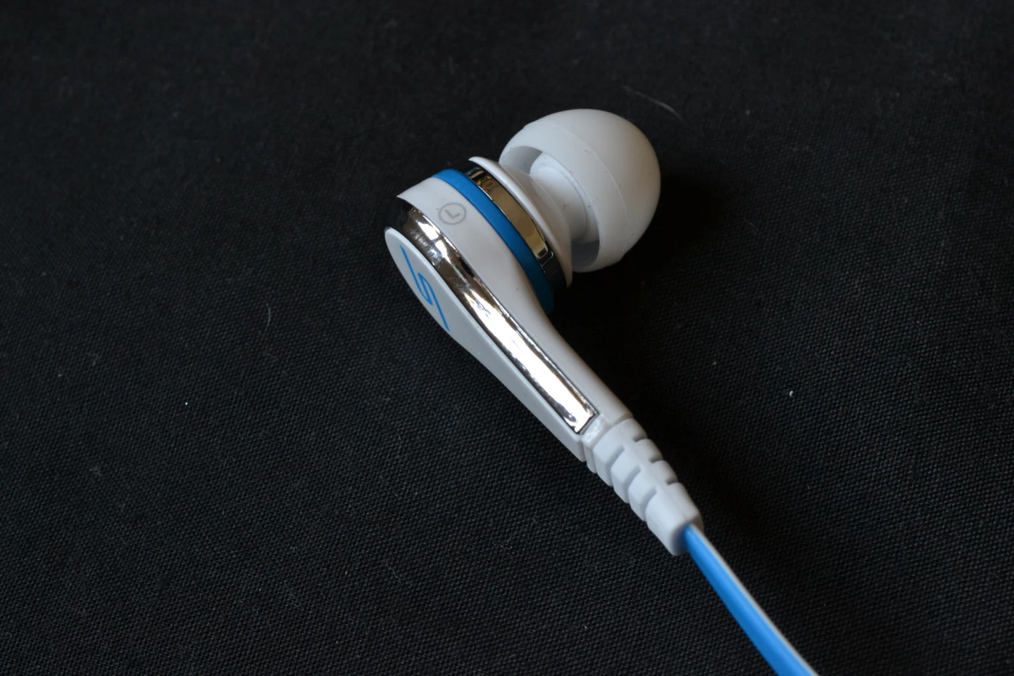 Of mostly ABS plastic construction and sharing design elements with their bigger brothers, the pure white is complemented by shiny chrome/silver finish that's tastefully interrupted with blue