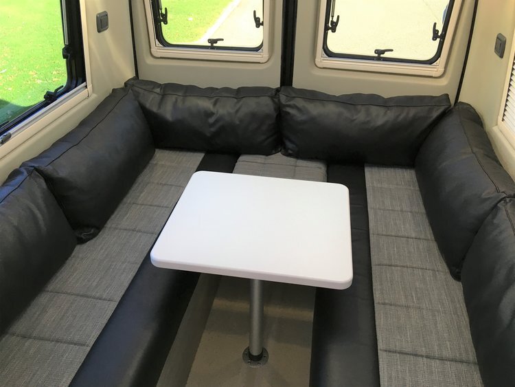 Wraparound sofa layout in the RP Rebel camper van