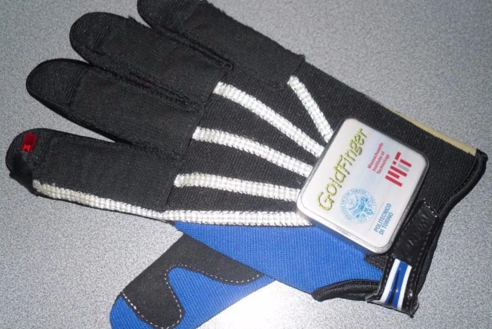Goldfinger uses components integrated into the glove fabric to make the device more comfortable and intuitive to use