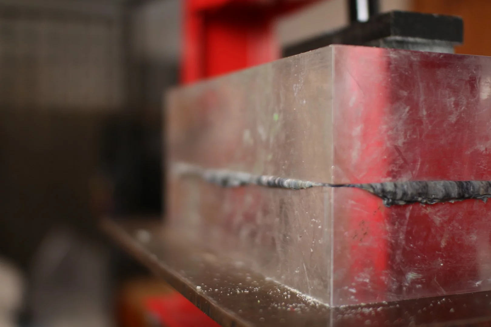 The mushed up flexible plastic waste is melted and compressed into molds to make the Gobi speaker housing modules