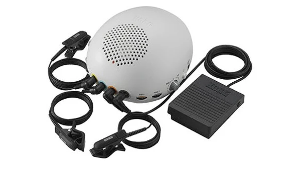 Cliphit from Korg consists of a main speaker unit, three clips to attach to household objects, and a footswitch