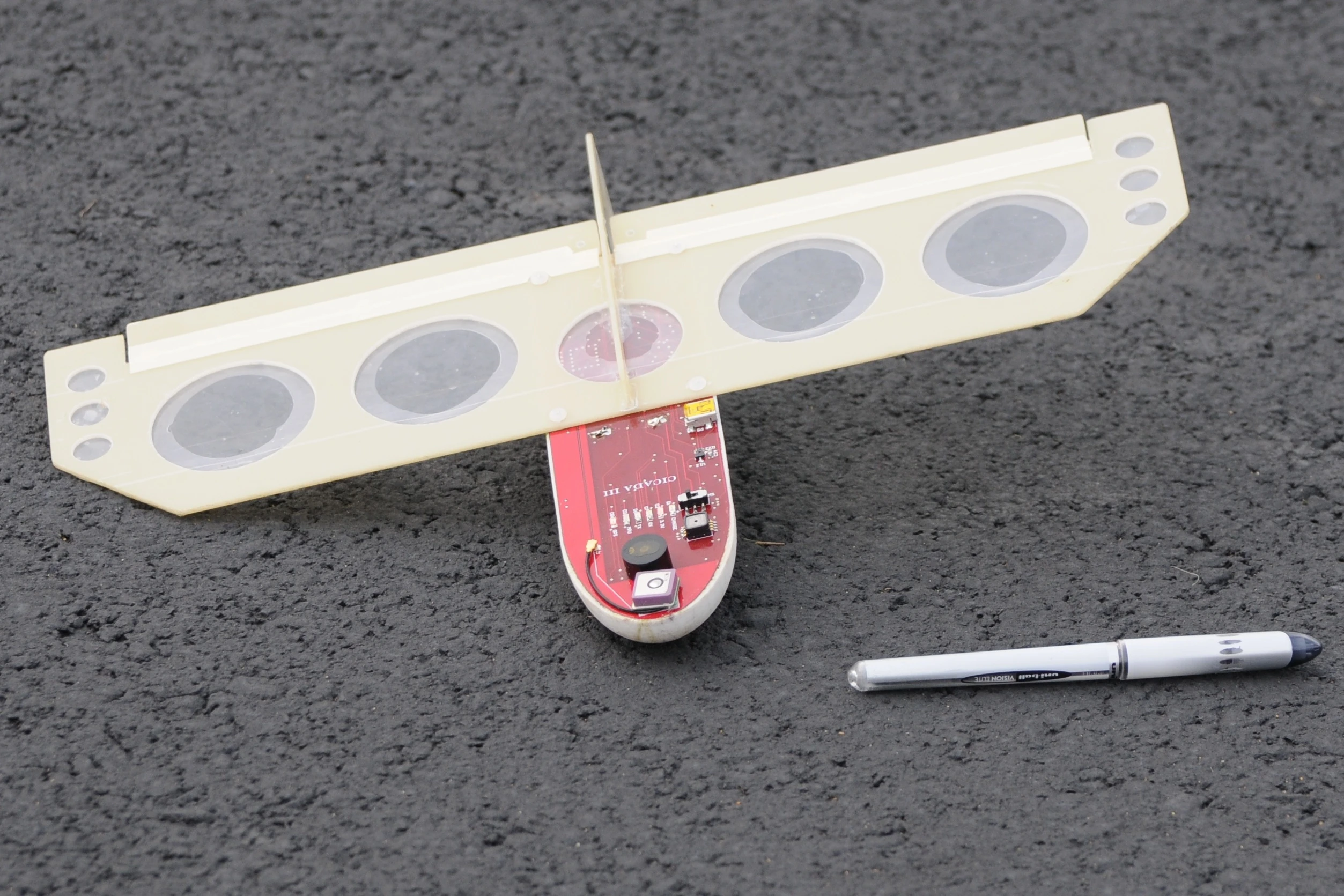 The CICADA is a gliding unmanned air vehicle, designed to deploy sensors in enemy territory (note the pen, for scale)