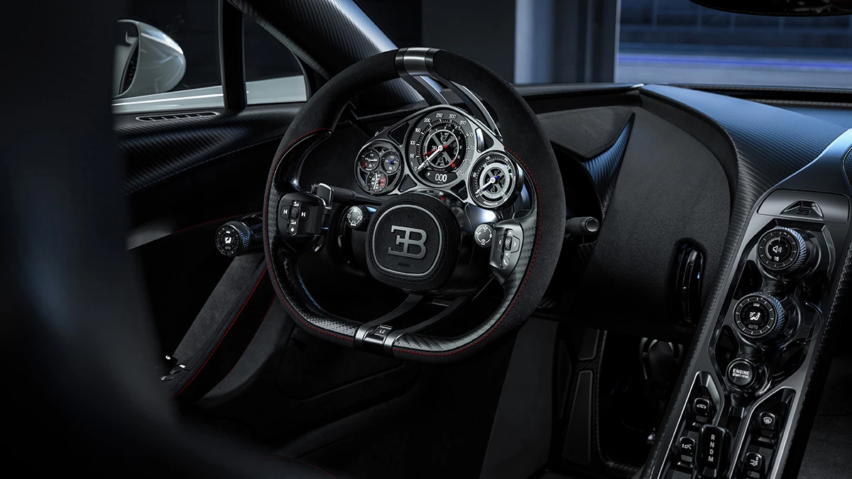 Feast your eyes on that intricate instrument cluster, containing more than 600 components hand crafted by Swiss watchmakers