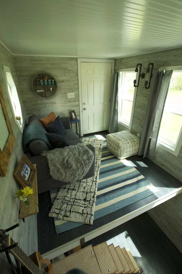 The Tiny Ski Lodge's lounge opens onto a small balcony