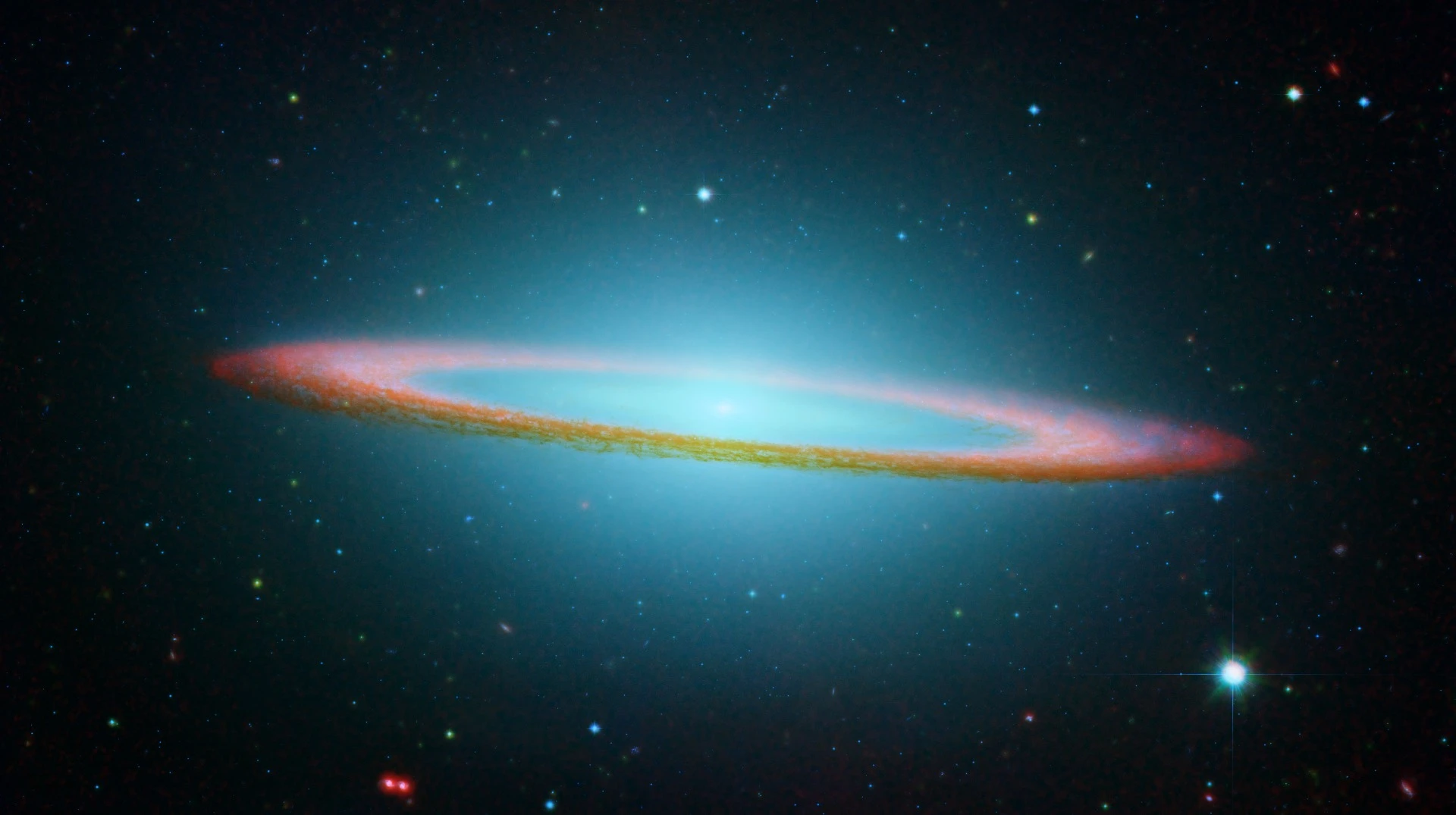 Messier 104 is commonly known as the Sombrero galaxy because in visible light, it resembles the broad-brimmed Mexican hat. However, in Spitzer's striking infrared view, the galaxy looks more like a "bull's eye."