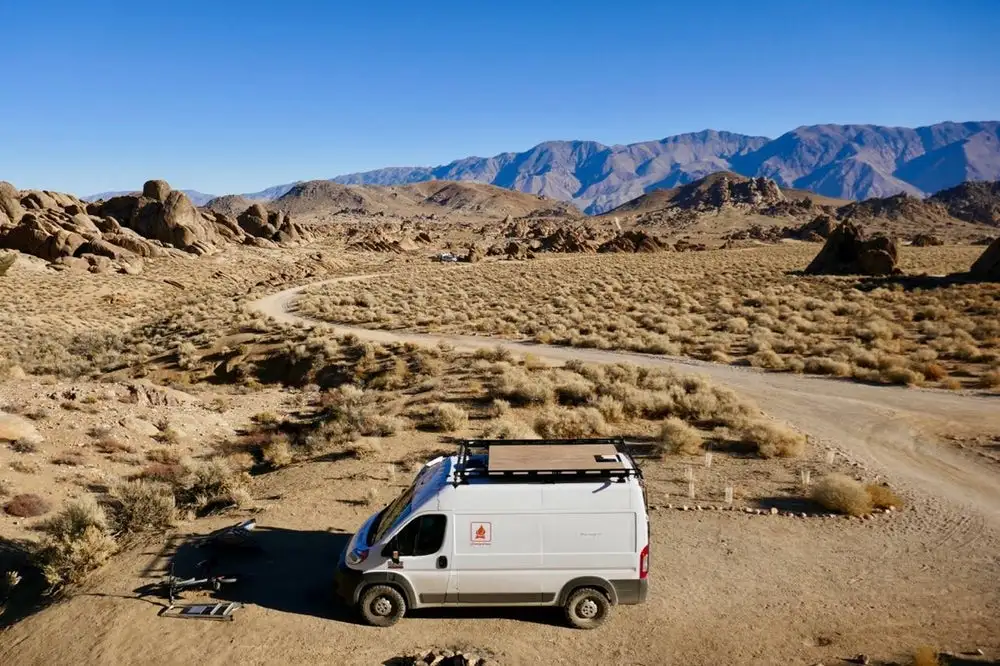 Glampervan's decking turns roof rack into porch without eliminating the rack's ability to haul gear