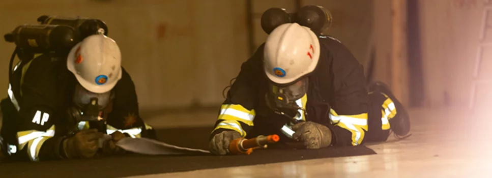 Firefighters testing the shoe-based digital positioning system 25 m below ground (Photo: Erik Groundstroem)