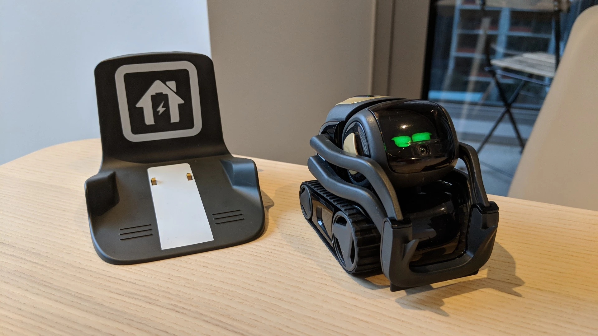 Vector and his charging dock, which he can find autonomously when his battery is running low or when you tell him to "Go home"