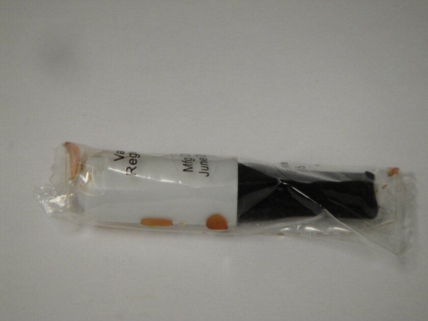 The image shows e-cigarette fluid leaking out of a cartridge, making it difficult to handle without touching the nicotine solution (Image credit: Talbot lab, UC Riverside)