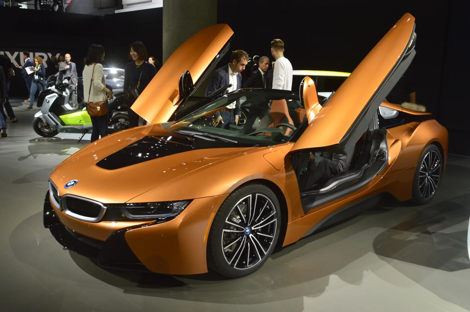 The BMW i8 began selling in 2014 as a 2+2 coupe made of carbon fiber and pure hybrid awesomeness