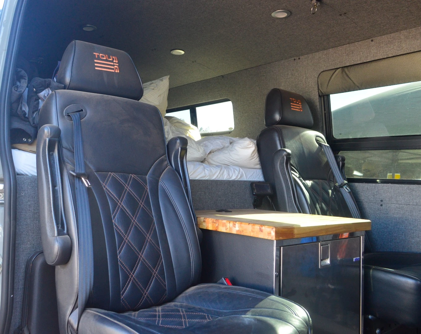 TouRig shows one of its custom vans at Overland Expo West 2017