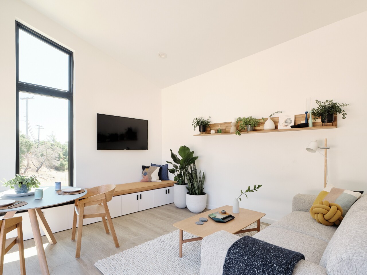 Built-in living room bench seating has hidden storage