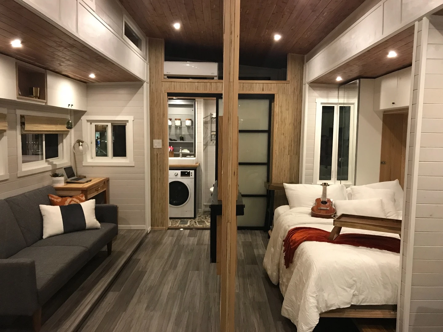 The dividing wall helps lend the Aurora more of a studio apartment feel than a typical tiny house