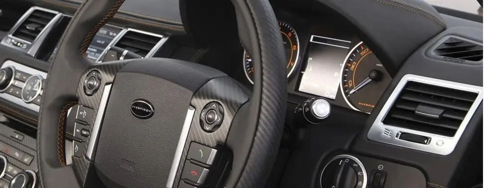 The GT steering wheel has carbon inserts and orange stitching