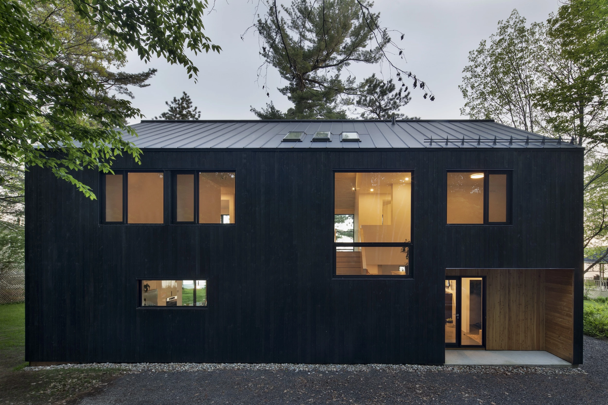 The Lakeside Cabin's rear and front each have a porch