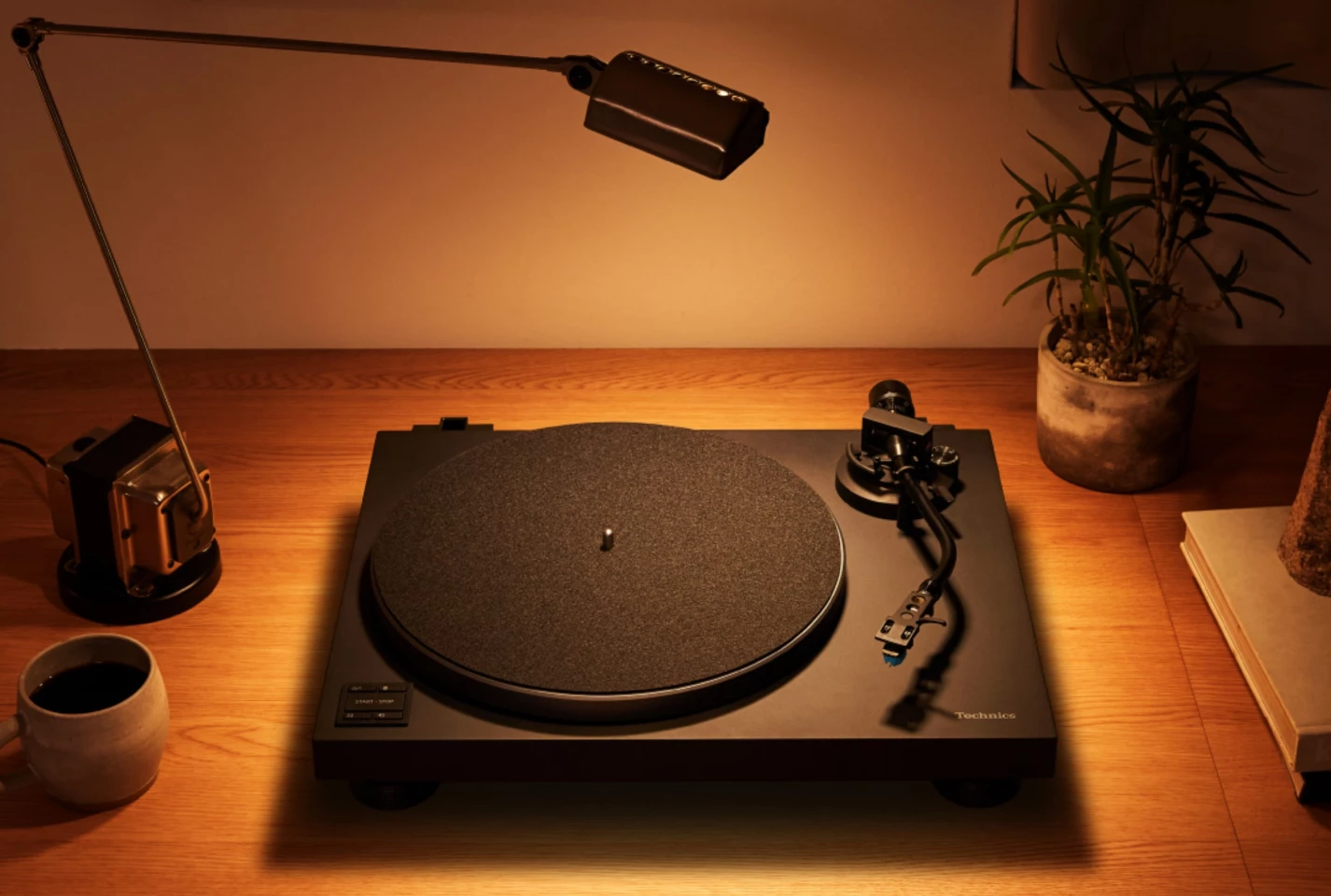 The direct-drive turntable can spin vinyl at either 33 or 45 rpm (though the wired-only version adds 78 rpm)