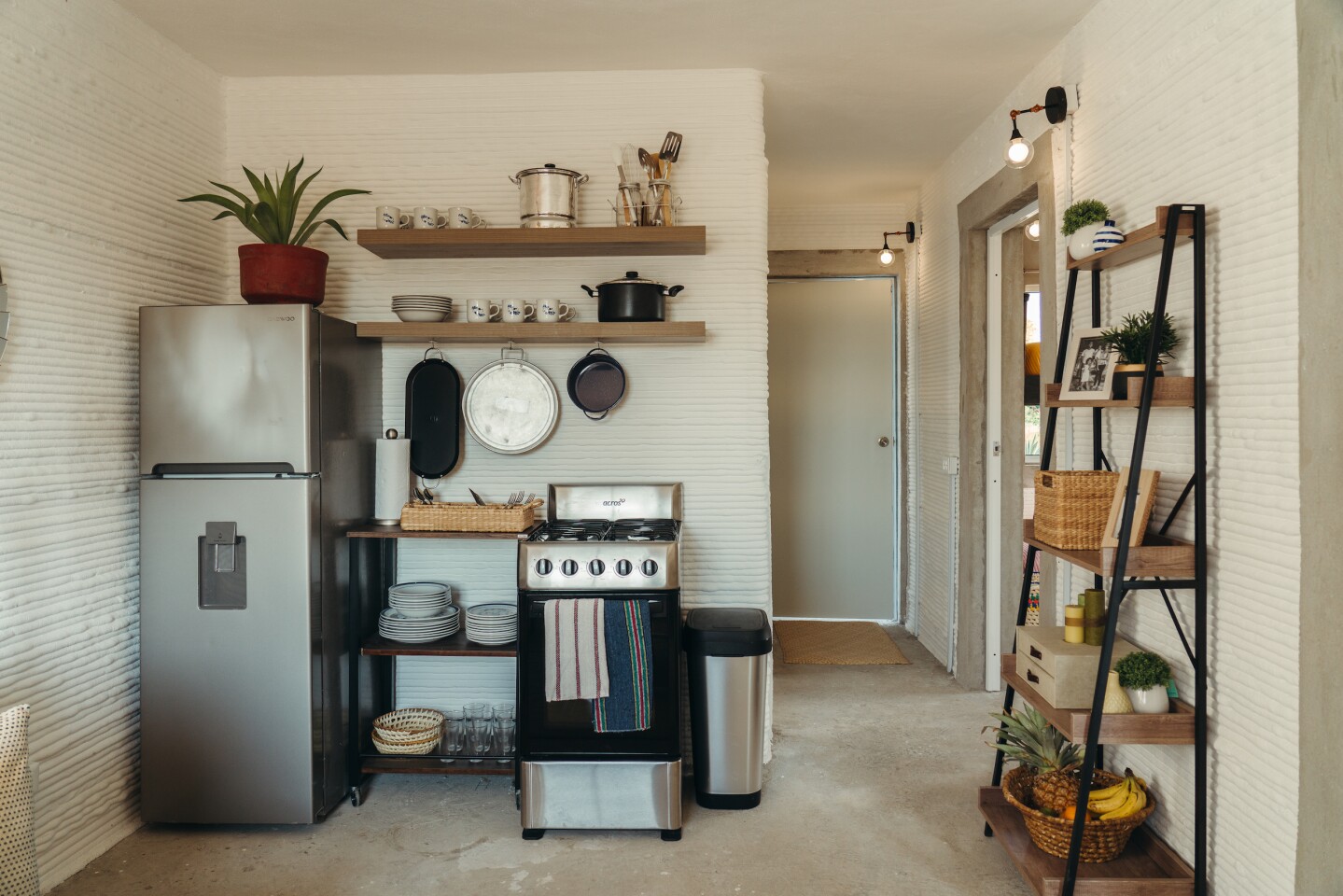 The interiors of the 3D-printed homes measure 500 sq ft (46.5 sq m) each