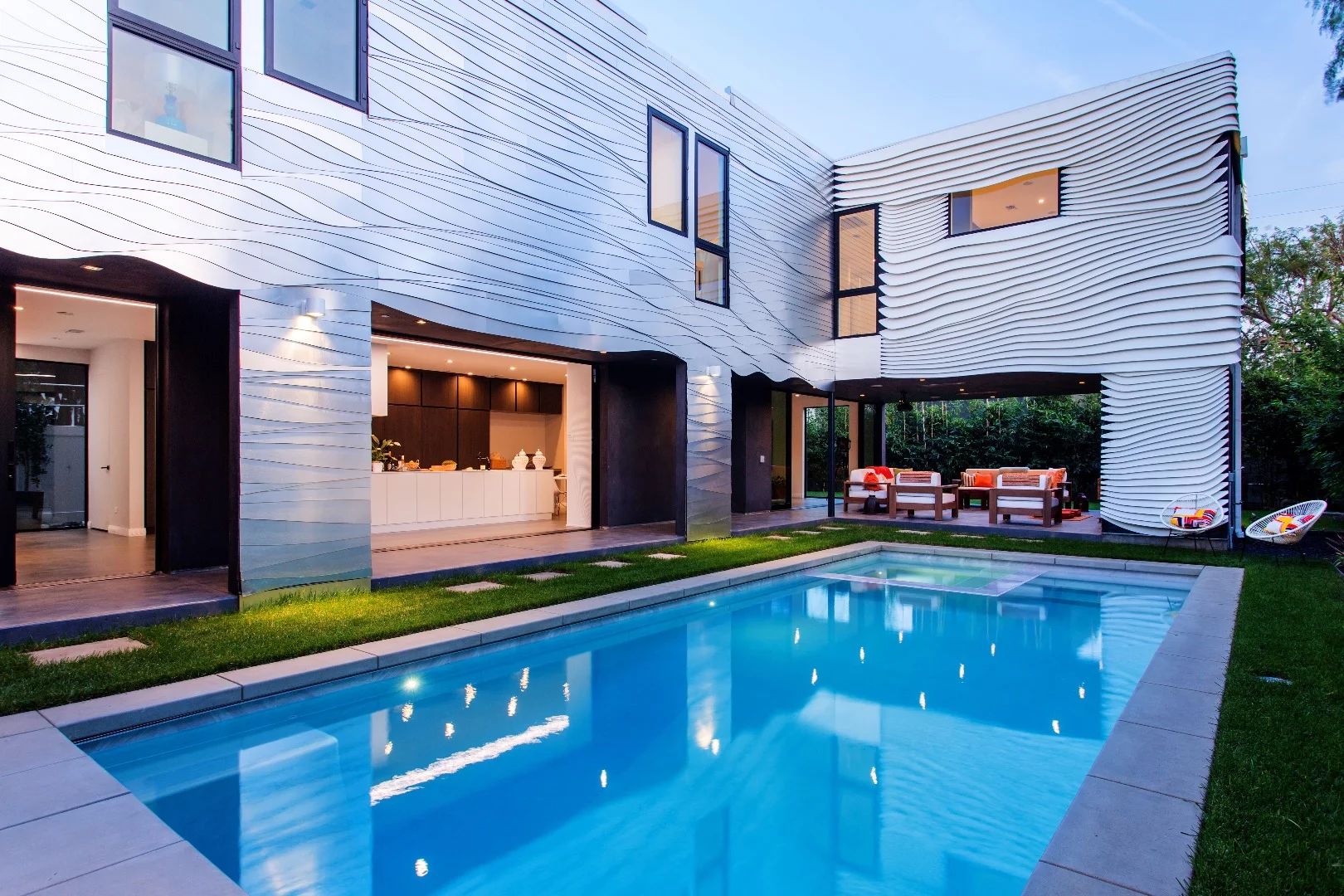 The Wave House has a total of five bedrooms and four bathrooms, and an outdoor lounge area boasts a small home cinema