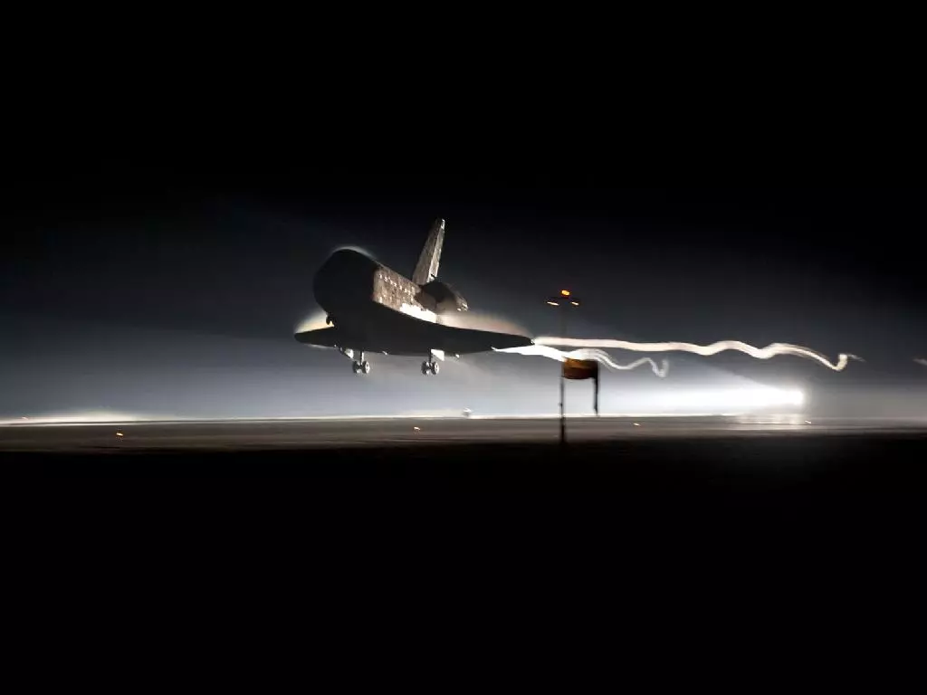 At 5:57 a.m. EDT on July 21, 2011, space shuttle Atlantis landed for the final time at NASA's Kennedy Space Center (Photo credit: NASA/Kim Shiflett)