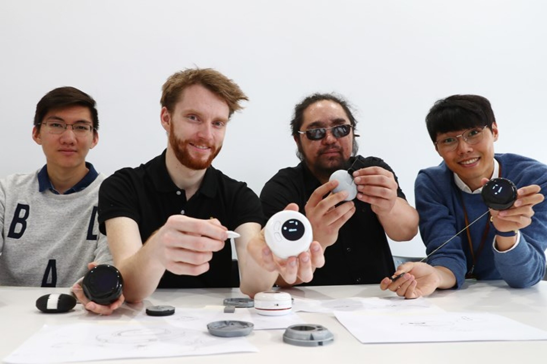 Students roll out connected tape measure for the vision impaired