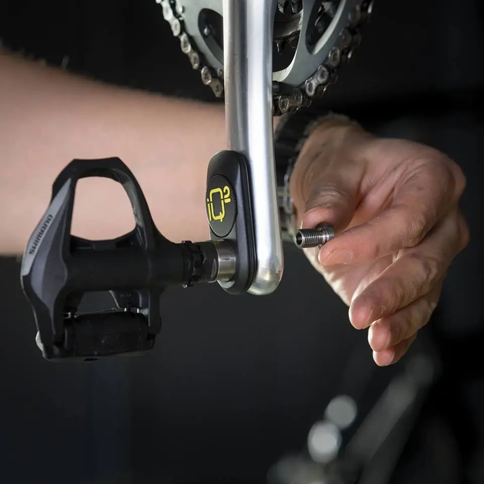 The IQ² is installed between the pedal and the crank