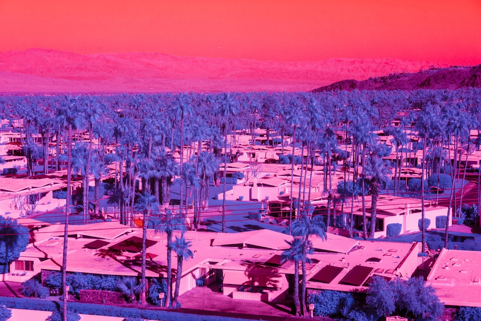 Kate Ballis’ series Infra Realism is an extreme, stylized take on the style contrasting images of classic mid-century Palm Springs architecture with jarringly sharp and disorientating infrared purples and reds