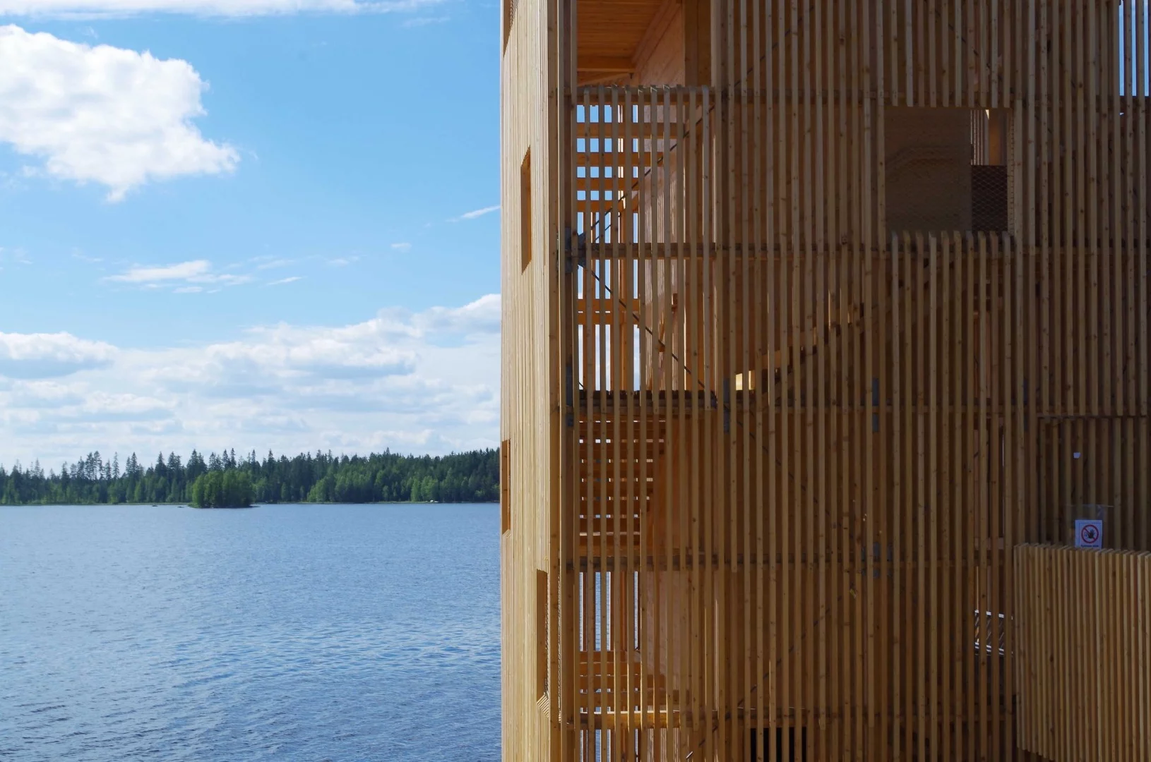 Located by a man-made lake near Seinäjoki, Finland, Periscope Tower comprises three prefabricated wooden sections, topped by a roof