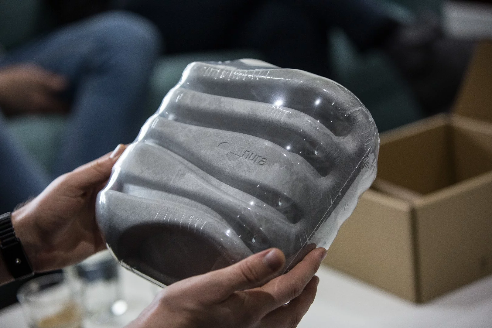 Nuraphones arrive in a biodegradable shipping box that the guys tell us is actually edible.