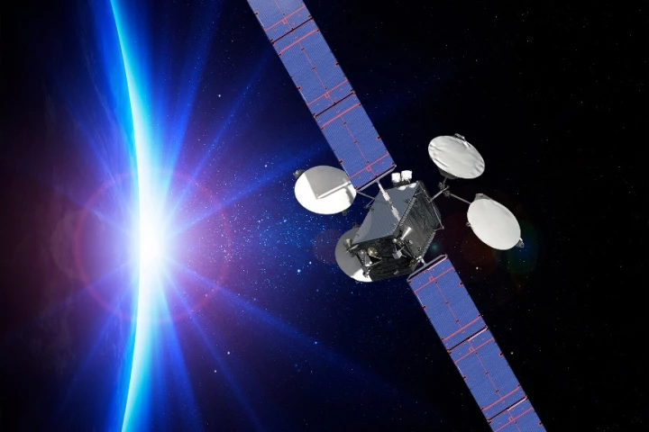 Artist's concept of the ABS-3A satellite which uses an ion propulsionsystem 10 times more efficient than liquid-fueled rockets