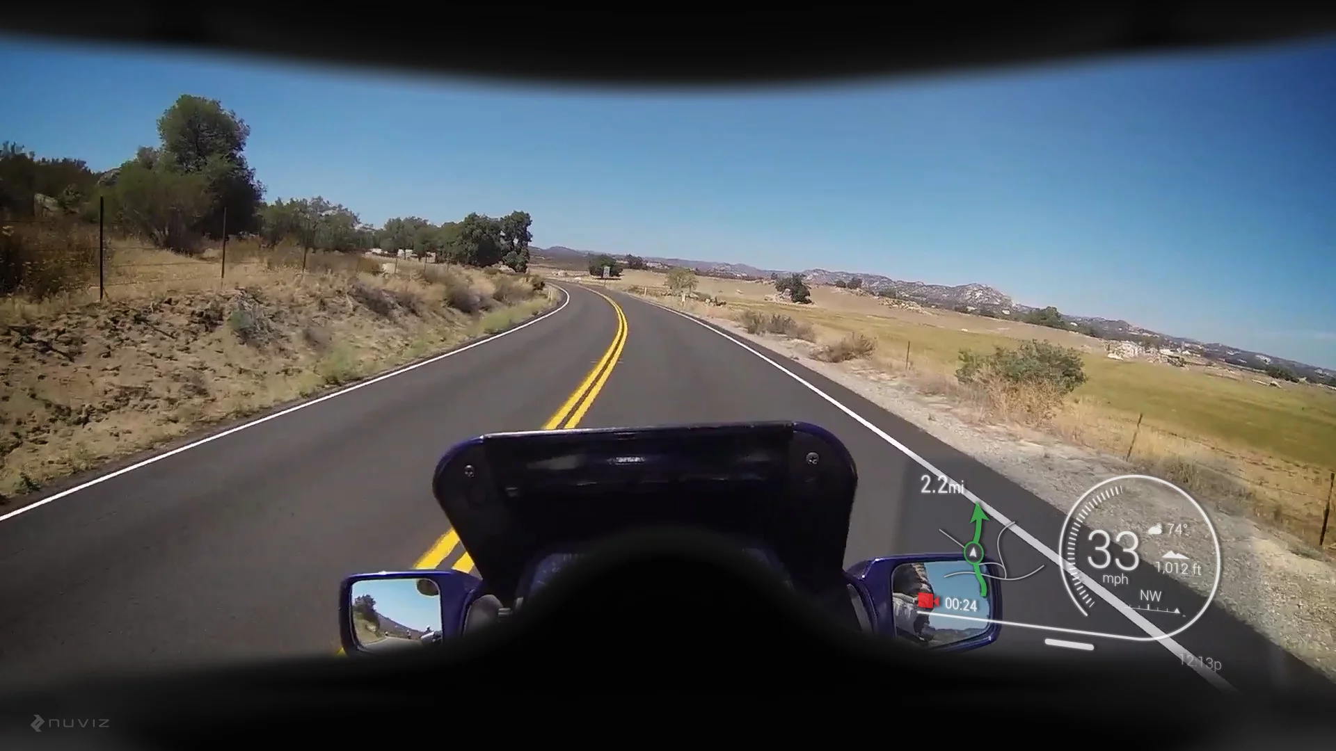 The Ride:HUD display (lower right) as seen through a motorcycle helmet