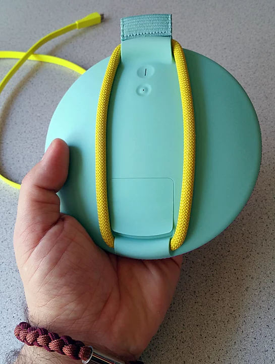 The underside of the Ultimate Ears Roll speaker shows how the marine-grade bungee attaches