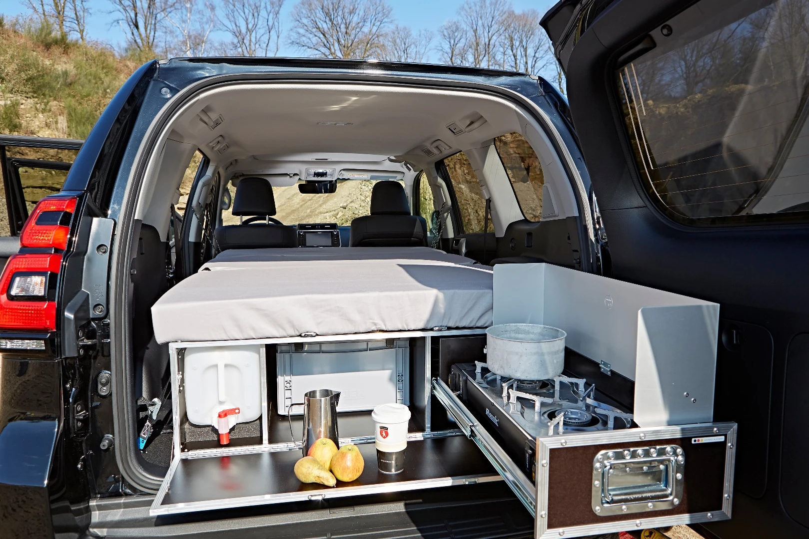 The Ququq Flatbox opens to reveal a simple but functional tailgate kitchen